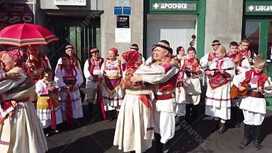 People playing traditional Croatian music and dancing in Zagreb