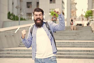 Energy concept. Joy and positivity. Route to work. Alone with music. Free and happy. Modern life. Man with headphones