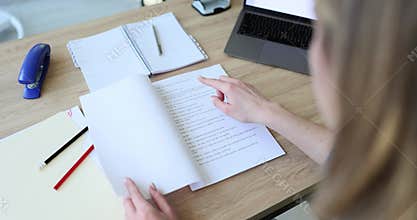 Woman hand opens scripts for filming TV show