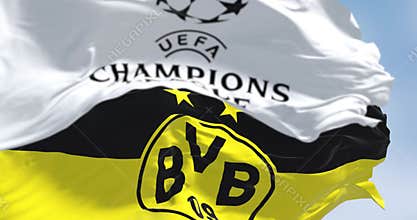 UEFA Champions League and Borussia Dortmund flags waving in the wind