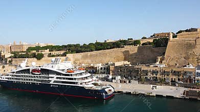 A Majestic View of Valletta&#x27;s Fortifications From the Grand Harbour. Valletta, the Capital City of Malta. The