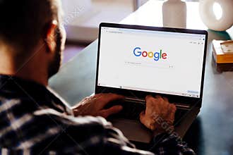 Google search engine on a laptop screen.