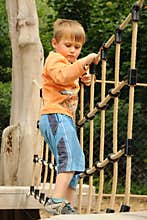 Child on rope barrier