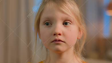 Portrait little girl pensive upset serious Caucasian child kid offended daughter schoolgirl at home school problem sad