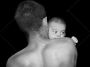 Father embracing baby
