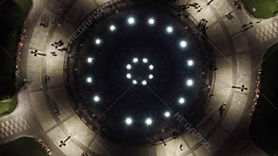 Look down aerial on fountain in night Kharkiv city