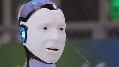 Futuristic robot with illuminated details at technology expo