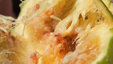 Figs in the hands of a man broken into two parts against the background of the sea. Live a healthy life. Be H3althy