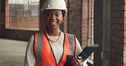 Confident Black Woman Engineer With Clipboard at Urban Construction Site