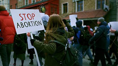 Pro life banner. Stop abortion placard at protest demonstration. Anti murder.