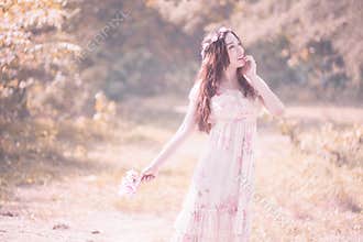 A young Asian woman posing in isolated blur background