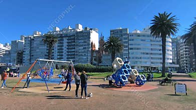 Families in urban park in Montevideo city, Uruguay