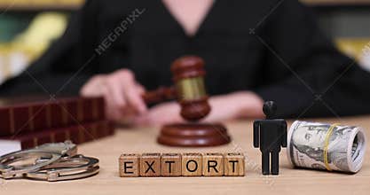 Courtroom drama unfolds as justice is served with a gavel and the weight of extortion