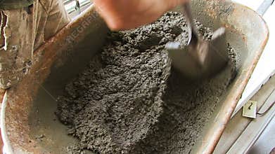 Mixing Concrete in a Wheelbarrow