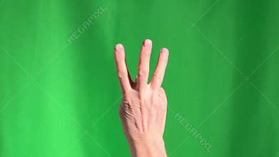Count down from five to one, hand on chroma key