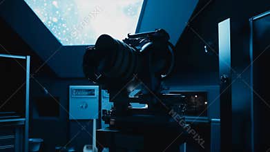 Planetarium projector creating cosmic star exhibition