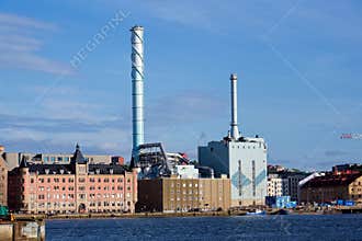 Roselundverket combined heat and power powerplant on bank of Gota river next to Alvstaden development construction site