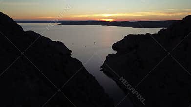 Aerial view of a dramatic canyon and rocky cliffs taken in Croatia