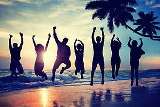 Silhouette People Jumping with Excitement on a Beach