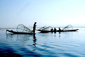 Fishermen on water