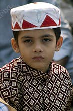 A young boy at Id prayers
