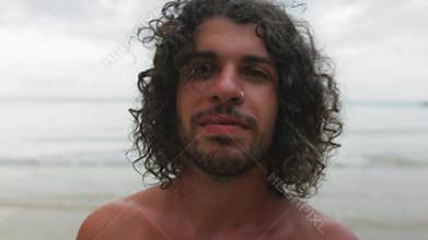 Handsome guy smilling outdoors close up portrait