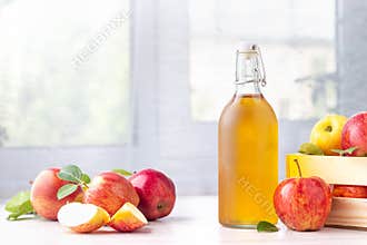 Healthy organic food. Apple cider vinegar in glass bottle.