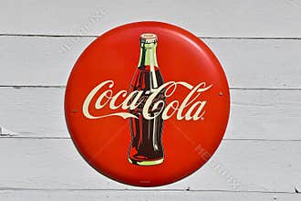Old Coca-Cola bottle sign