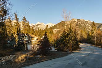 FAIRMONT HOT SPRINGS, CANADA - MARCH 22, 2019: street view of small town residential housing in spring time