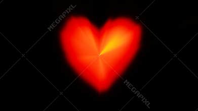 Beating heart red glow motion black background