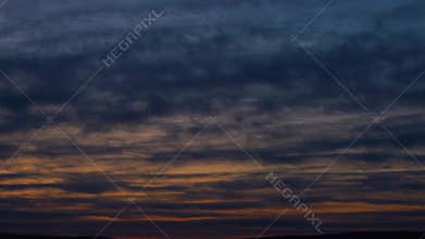 Time lapse of low clouds over a forest.