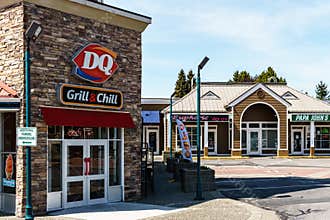 SURREY, CANADA - May 5, 2019: Sunshine Village Strip mall or shopping plaza sunny spring day