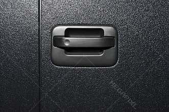 Textured car bodywork with handle