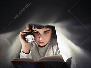 Boy reading book