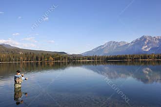 Fly Fishing In Rocky Mountains, Alberta, Canada