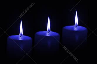 Three blue candles