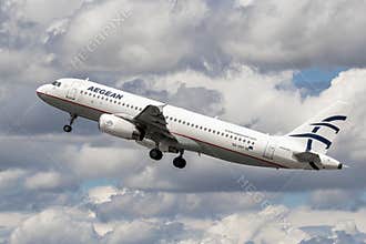 Aegean airline -Airbus A320  - taking off for vacation in summer time