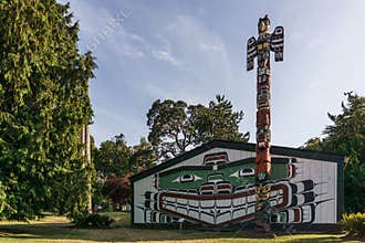 VICTORIA, CANADA - JULY 13, 2019: First Nation's Wawadit'la House and Totem Pole near Royal BC Museum