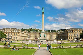 STUTTGART, GERMANY - JUNE 12, 2019: tourists in Schlossplatz with JubilÃ¤umssÃ¤ule column and the New Palace Neues Schloss