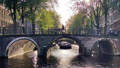 Amsterdam canal Singel with typical dutch houses and houseboats