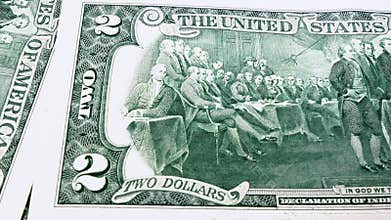 Sliding video of a two US dollar bill note