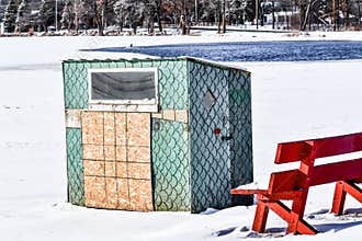 Ice Fishing Shanty covered in Fish Scales