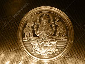 Silver gold metal vintage coin with Hindu God