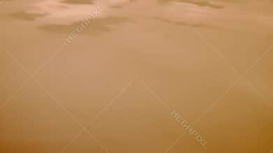 Ripples and waves appear on brown dirty water surface. Smooth liquid surface with wave motion of water. Macro shot of
