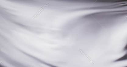 Animation of white fabric blowing with copy space over black background