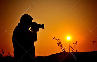 Hobby photographer silhouette