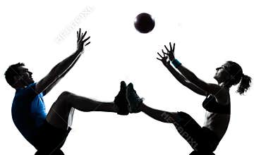 Man woman exercising workout tossing fitness ball