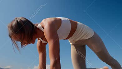Caucasian beautiful woman doing yoga in the park. Be H3althy