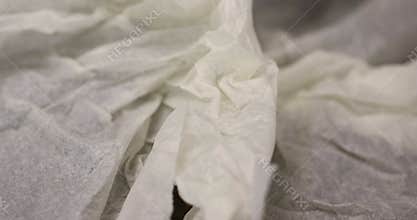 thin paper made of cellulose as a packaging material for clothing
