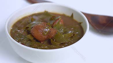Pork Curry with sour leaves. it\'s a traditional Eastern Thai curry originating from Thailand.
